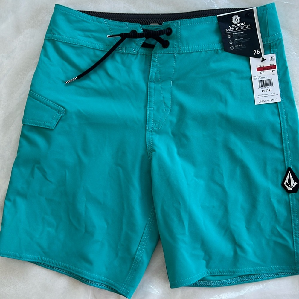 I think these are boys size shorts.  26 (12).   Board shorts.  Water repellant.